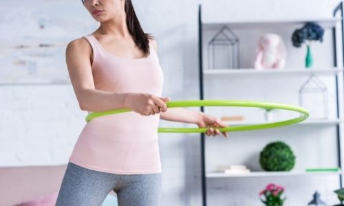 What exercises and workouts can you perform with a hula hoop